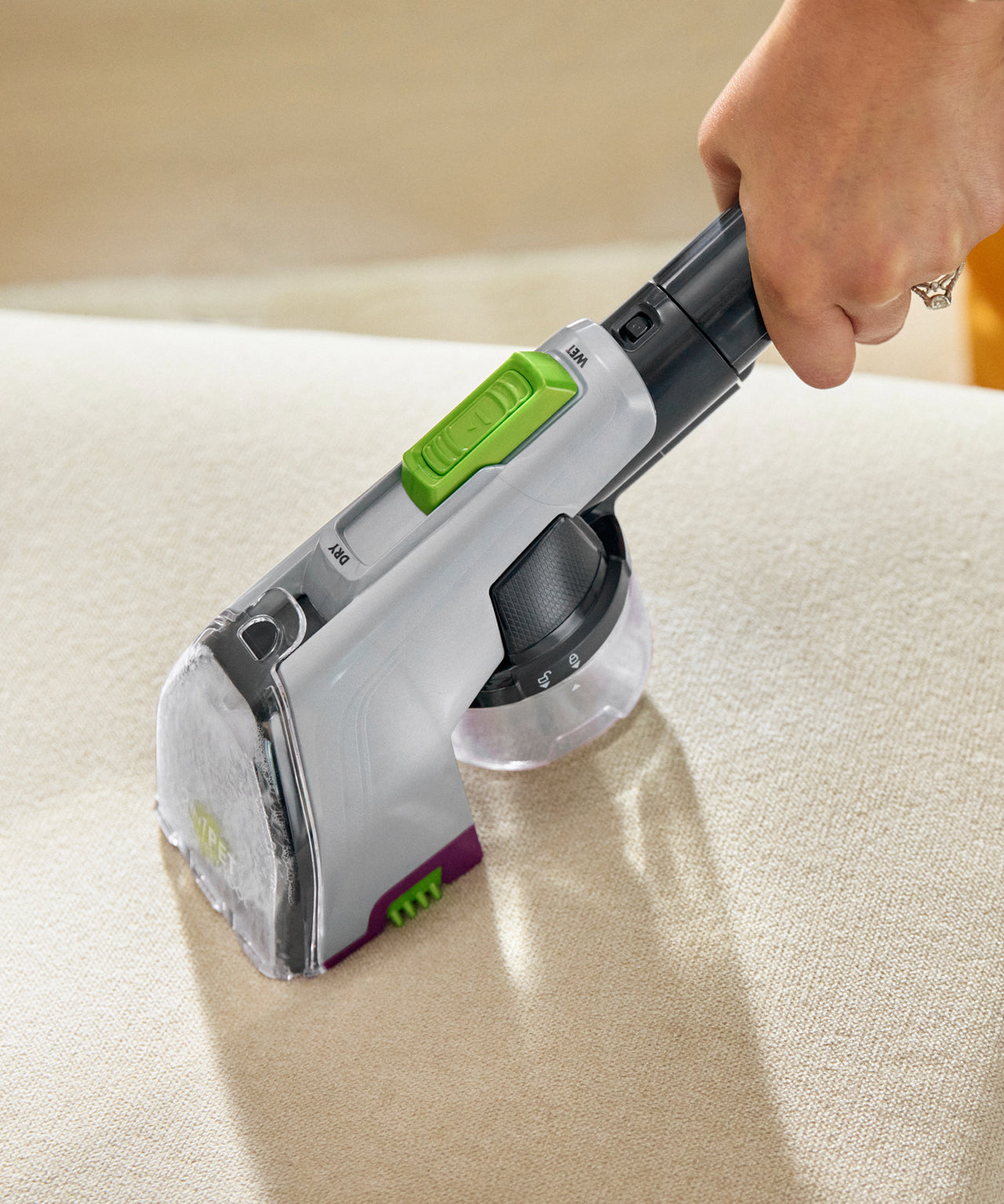 Using Pet tool to deep clean upholstery