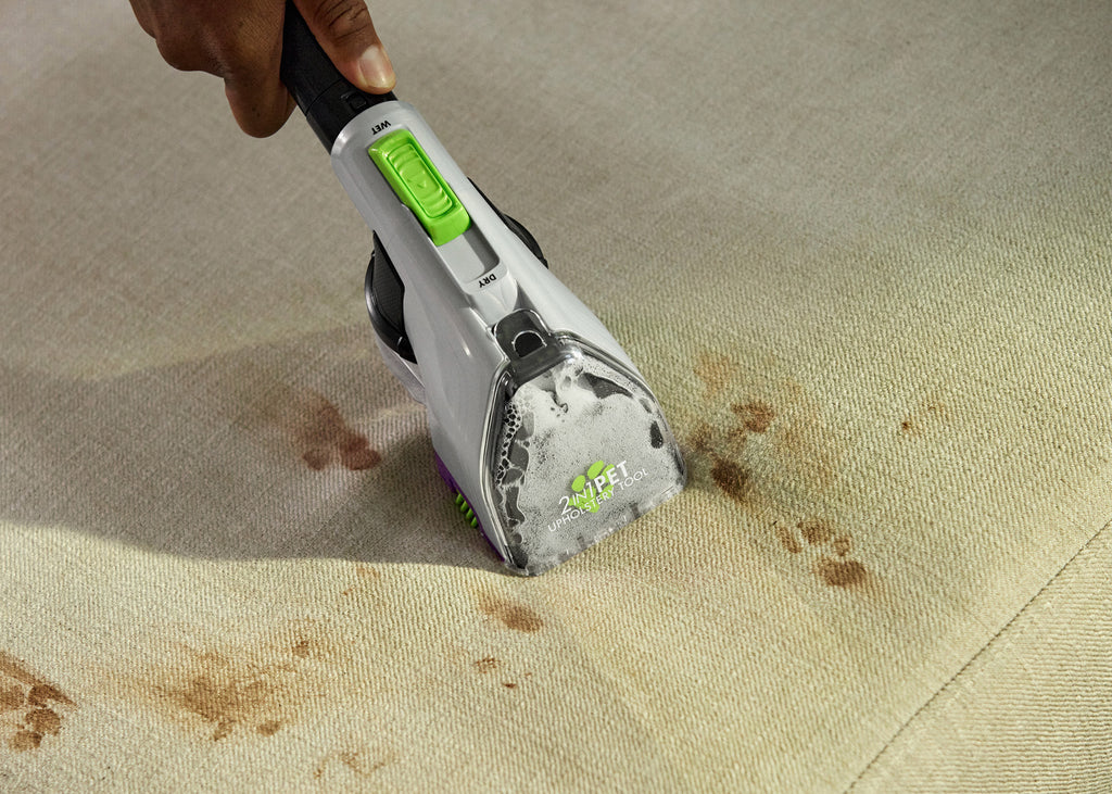 Using Deep Cleaning Tool attachment to clean upholstery