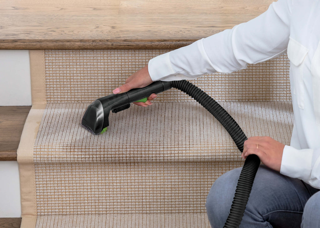 Using Portable Machine to clean Carpet on Stairs.