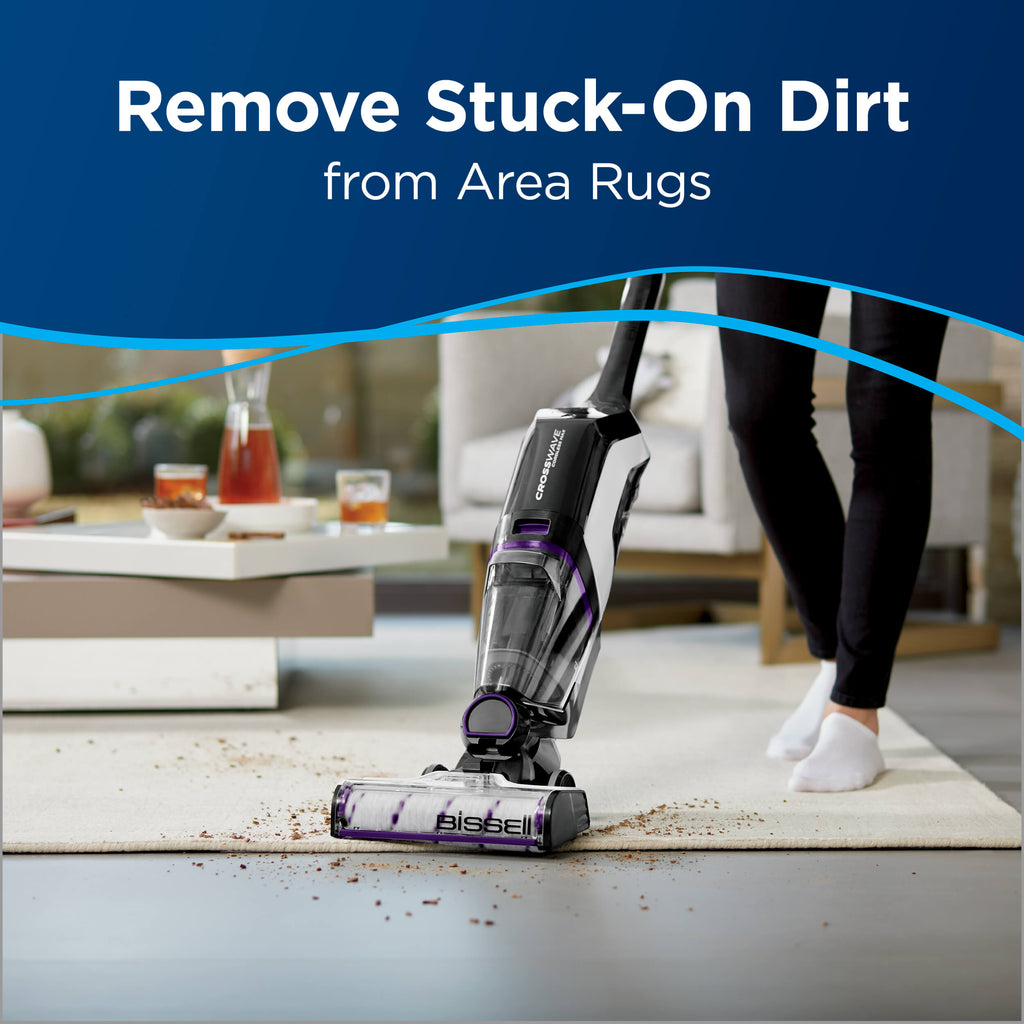 Area Rug Brush Roll 1618639 in use Text: Remove
                        Stuck-On Dirt from Area Rugs