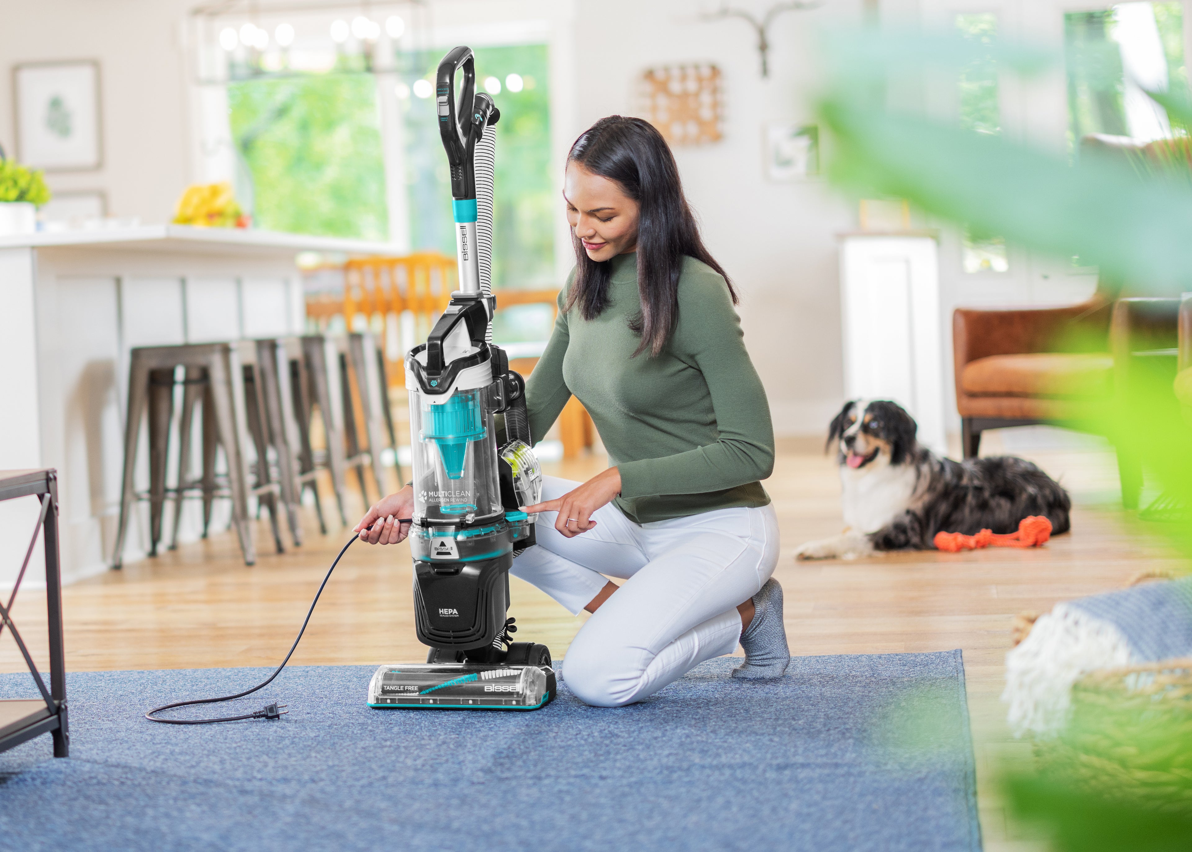 Rewinding Cord back into MultiClean Allergen Pet Slim Vacuum.