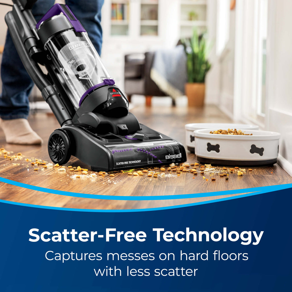 CleanView Compact Vacuuming dog food from hard
                        flooring. Text: Scatter-Free Technology Captures messes on hard floors with
                        less scatter