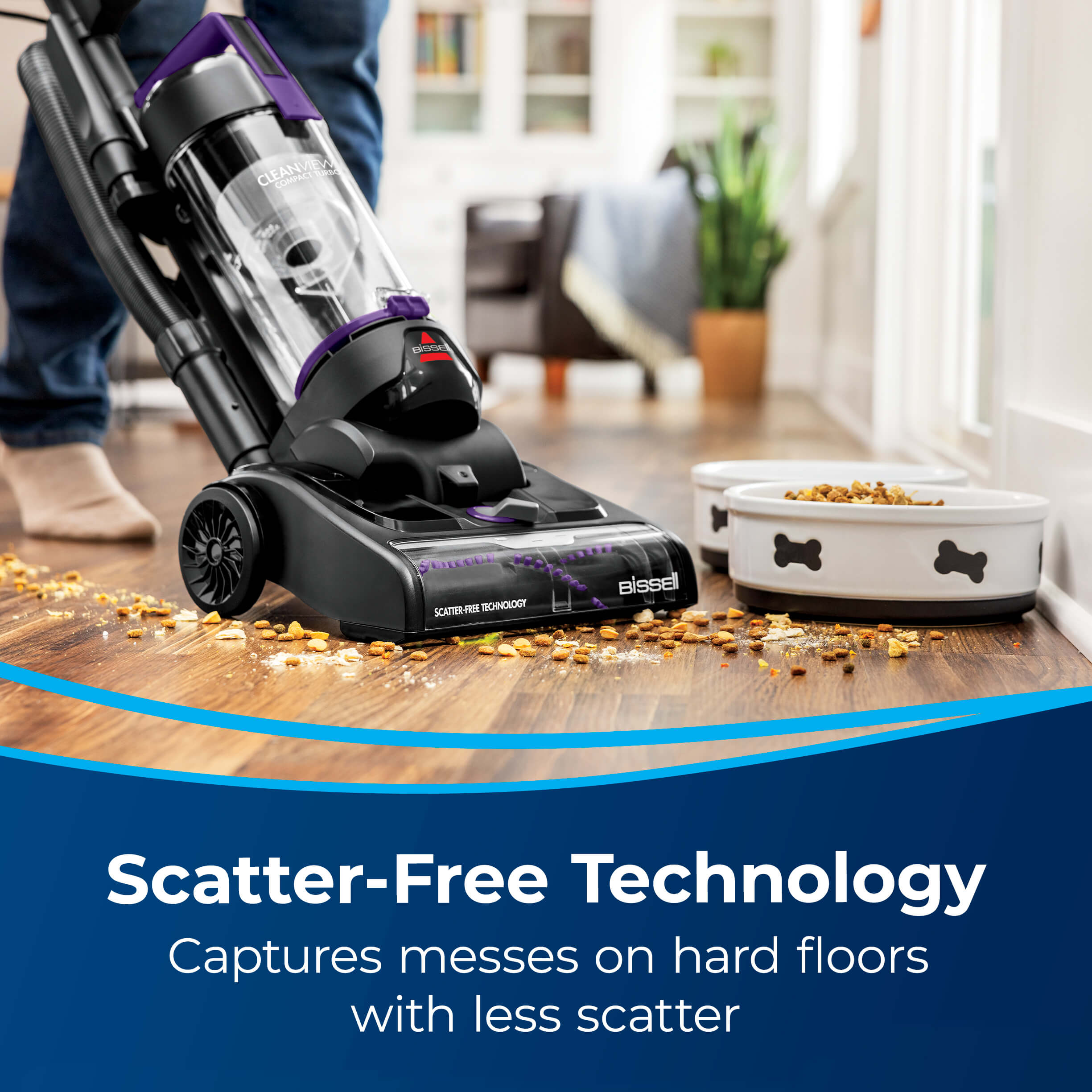 CleanView Compact Vacuuming dog food from hard
                        flooring. Text: Scatter-Free Technology Captures messes on hard floors with
                        less scatter