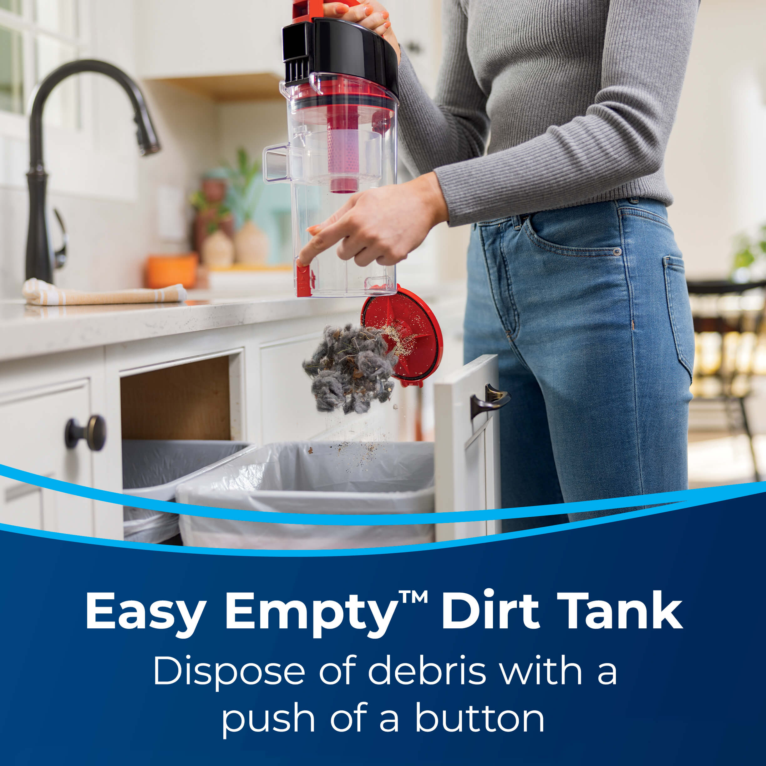 Emptying Dirt Tank. Text: Easy Empty Dirt Tank Dispose
                        of Debris with a push of a button
