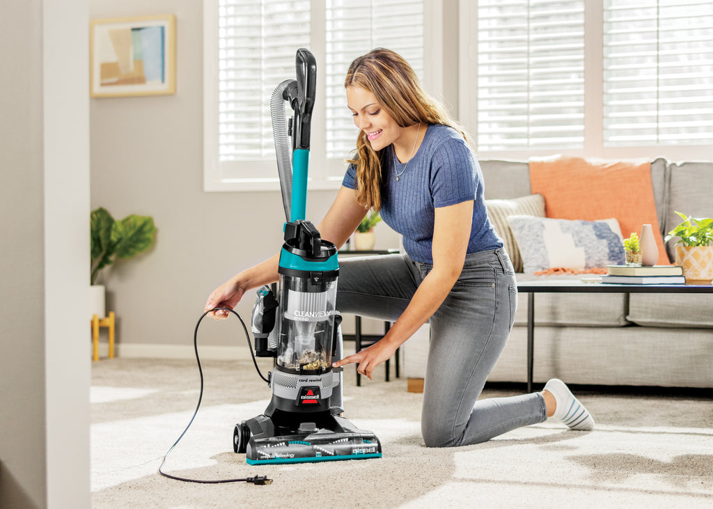 Rewinding Cord Back into Vacuum.