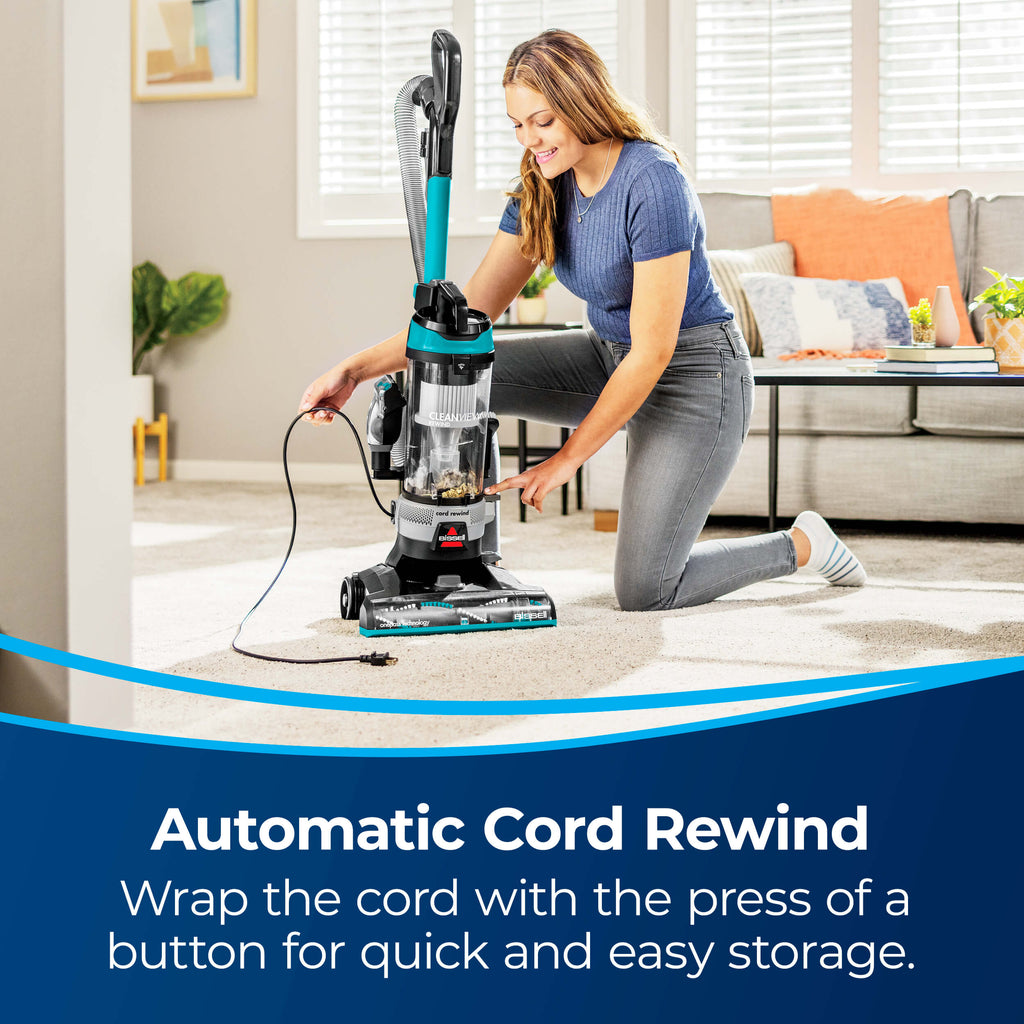 Rewinding Cord Back into Vacuum. Text: Automatic Cord
                        Rewind. Wrap the cord with the press of a button for quick and easy storage