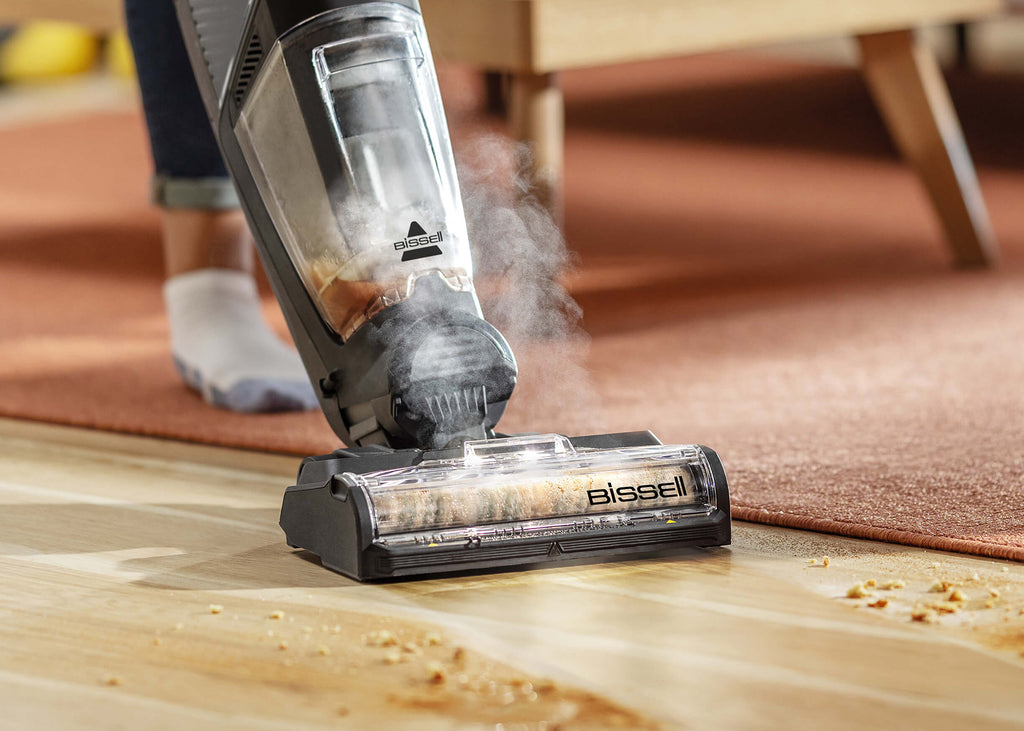 CrossWave HydroSteam vacuuming and mopping spill on
                        sealed wood floors
