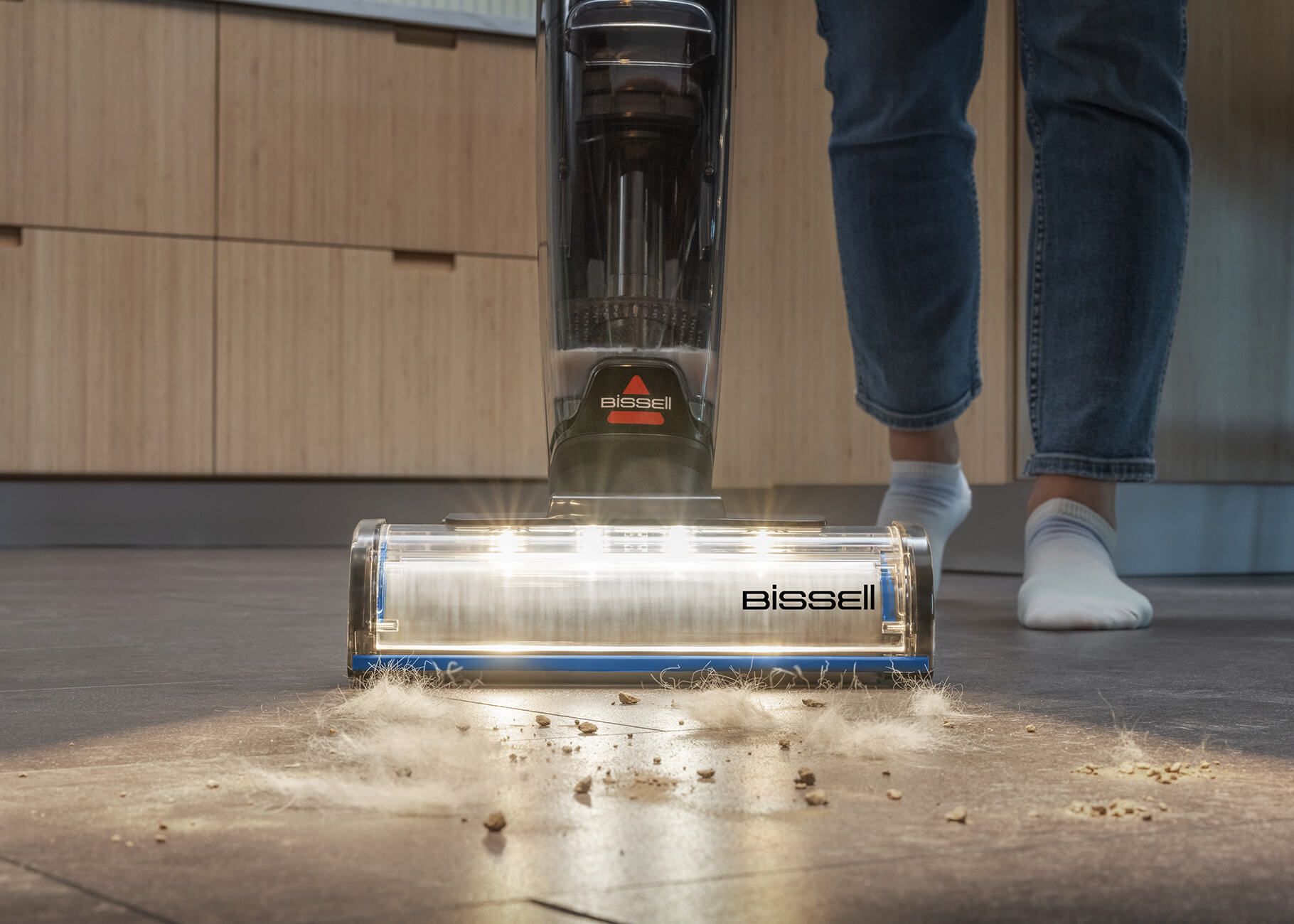 CrossWave OmniFind using headlight feature to vacuum
                        pet hair.