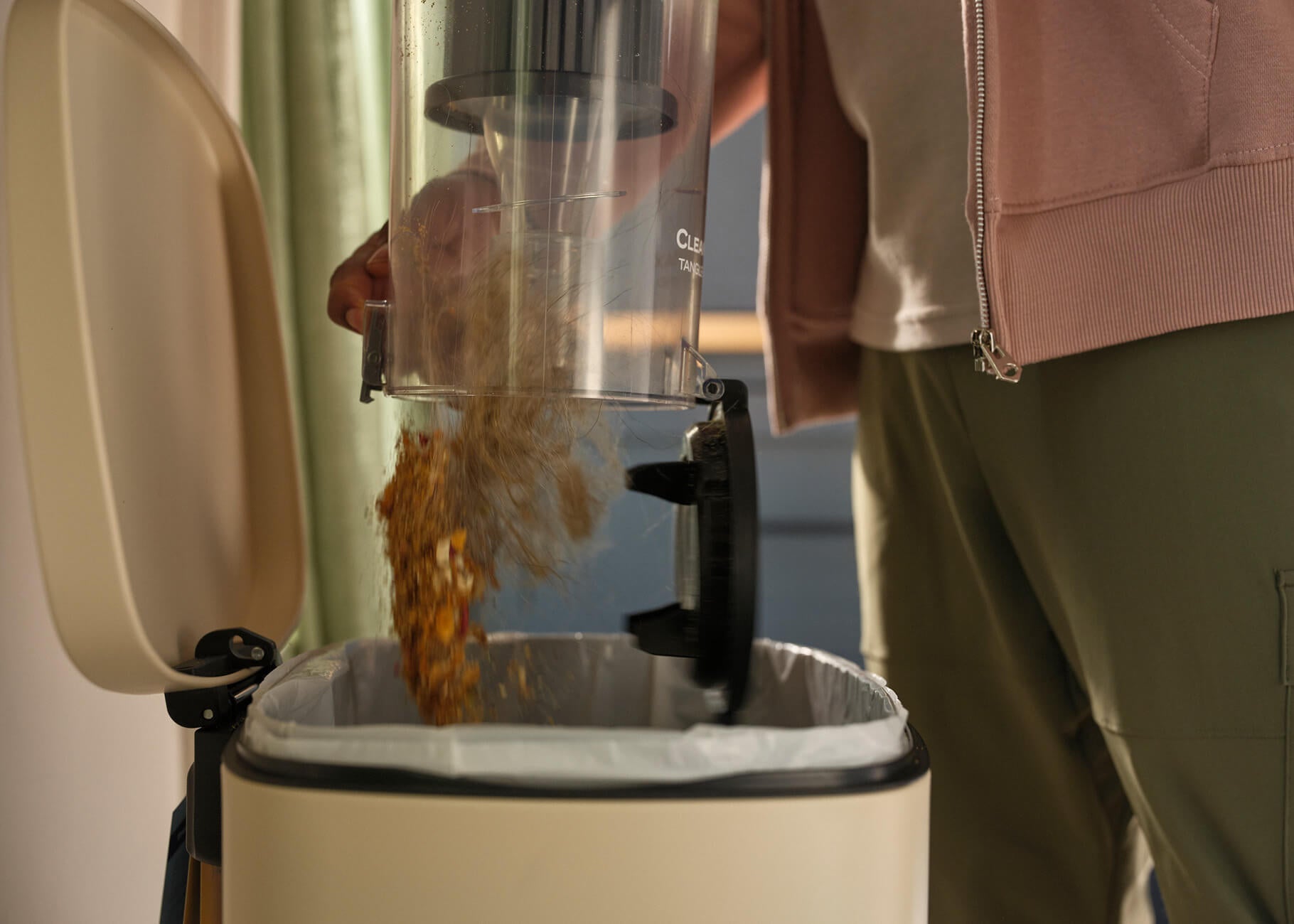 Dust bin on CleanView Max Tangle-Free vac empties easily