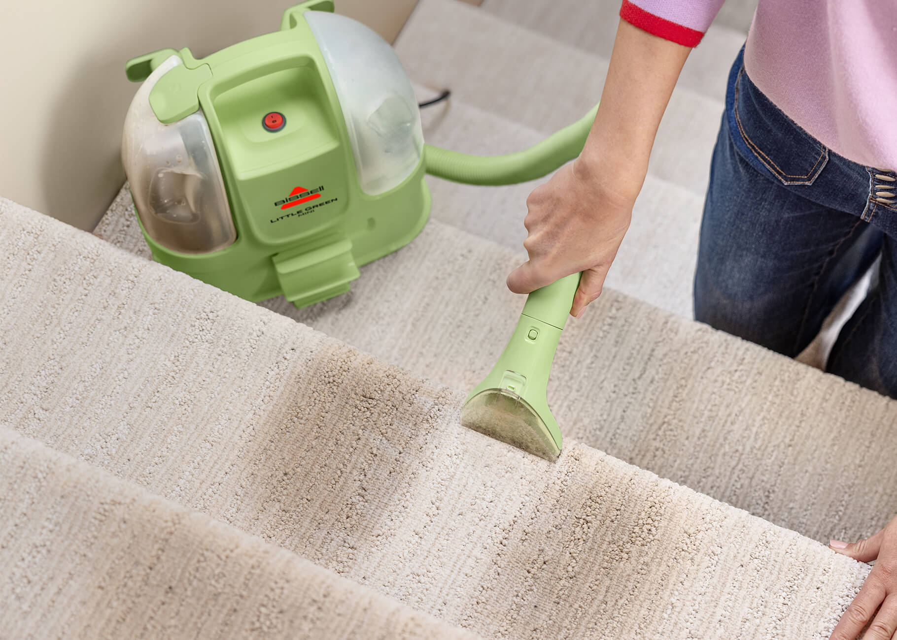 Little Green Mini cleaning stain on stairs