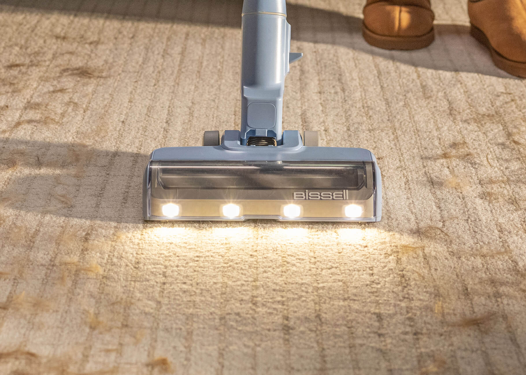 Vacuuming hair on carpet