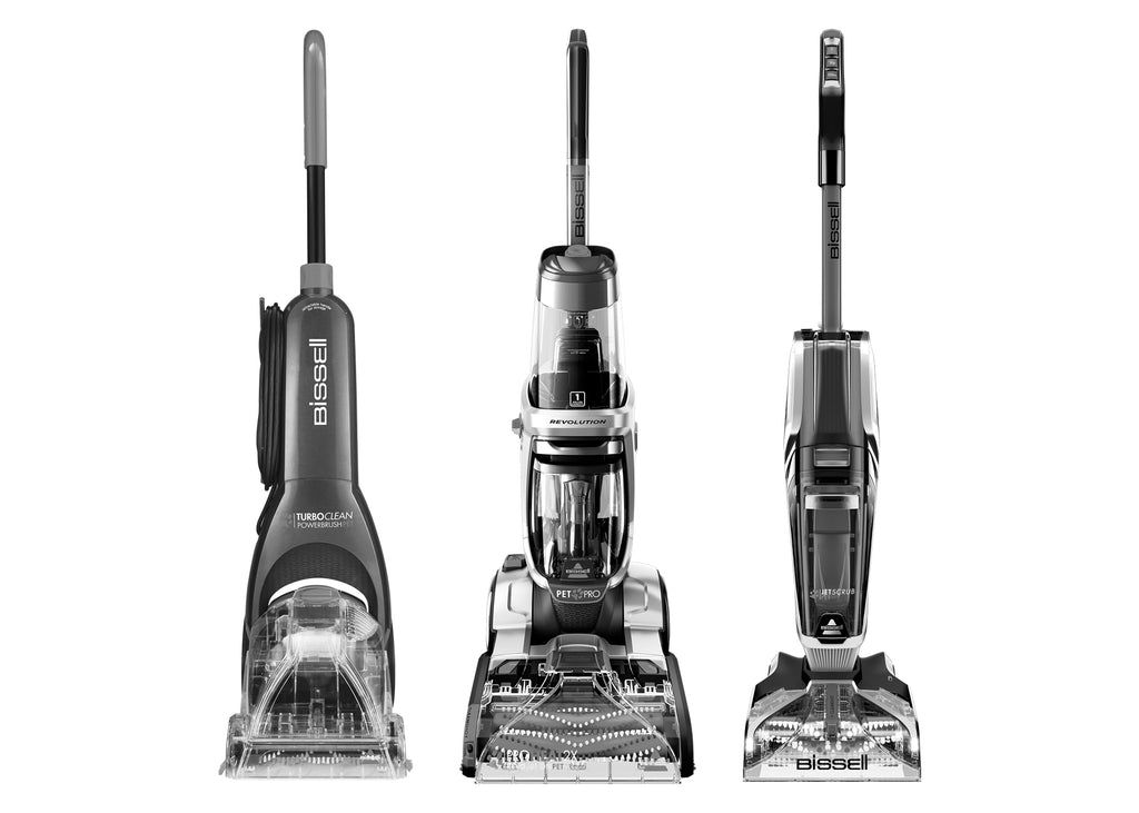 Three BISSELL upright carpet cleaners. 
