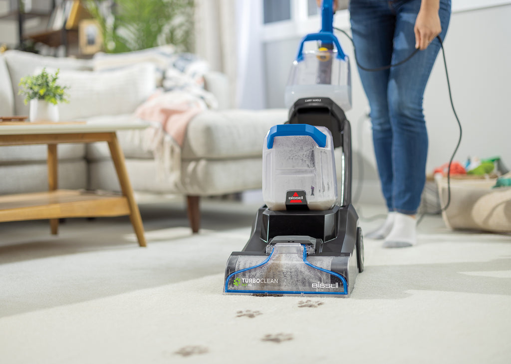 Upright Carpet Cleaner cleaning carpet.
