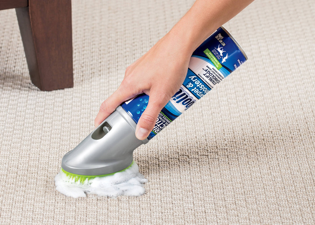 Using Woolite Carpet and Upholstery Cleaner to clean stain on carpet