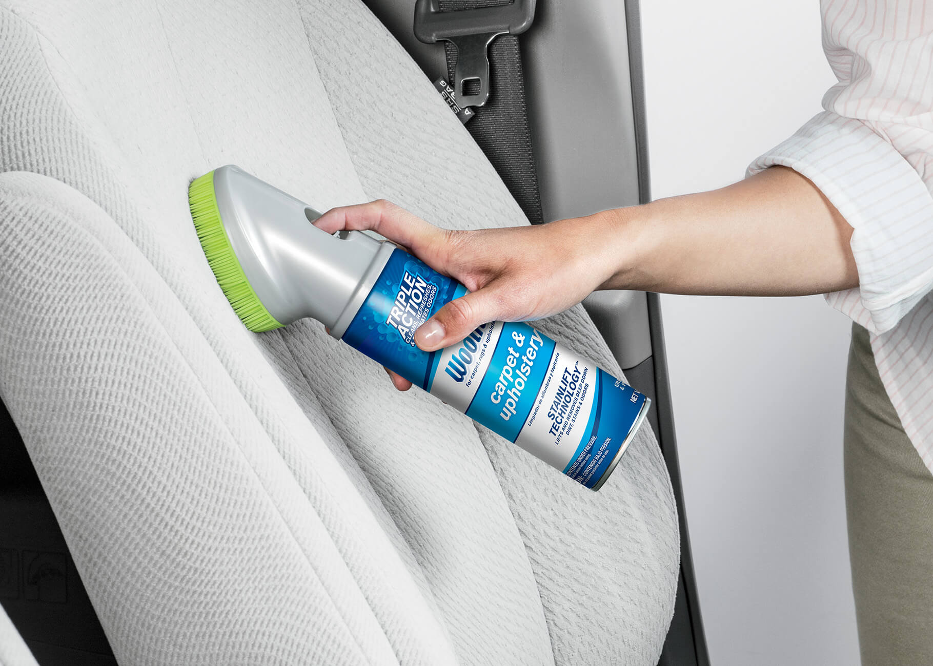 Using Woolite Carpet and Upholstery Cleaner to clean spot on car upholstery