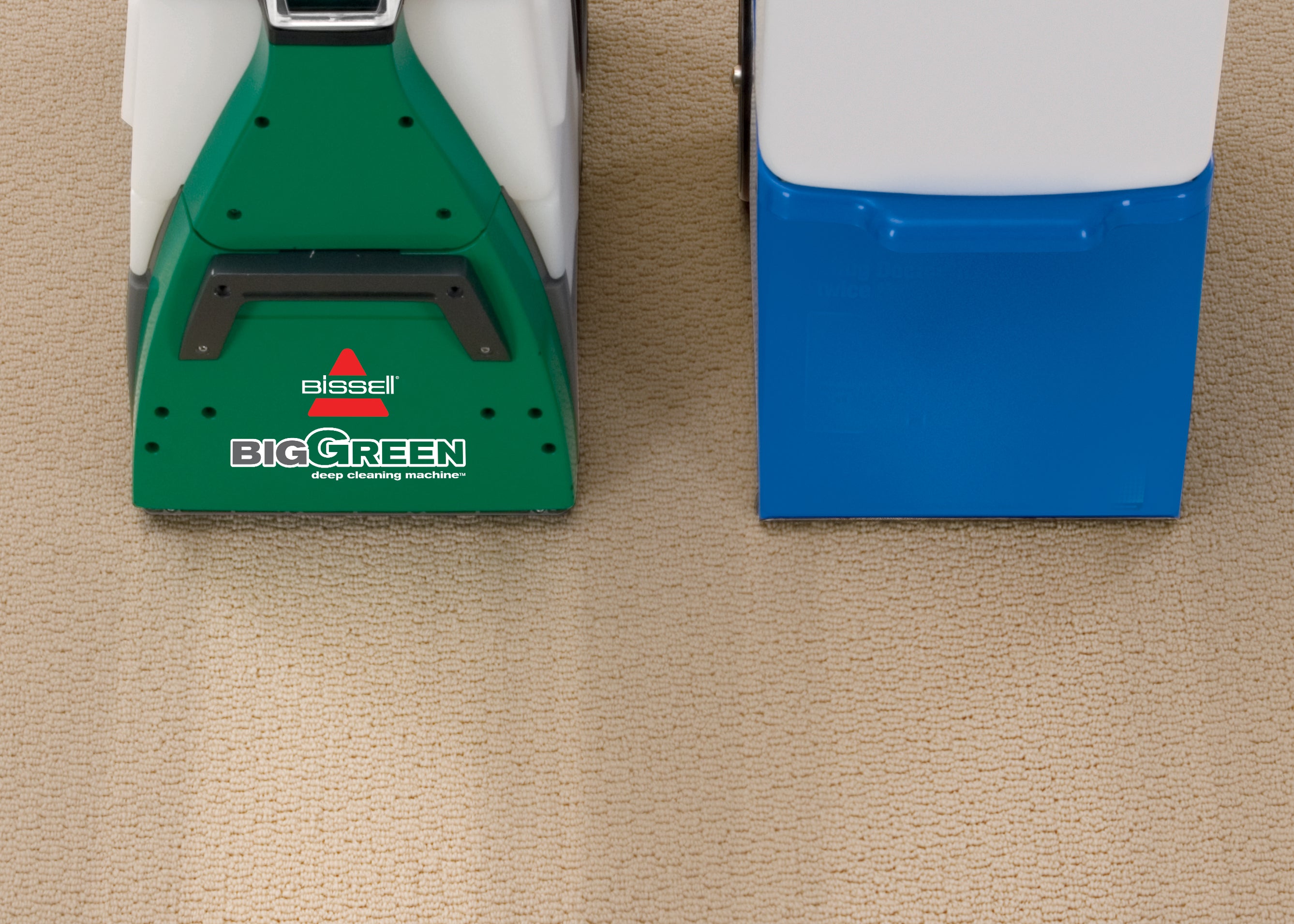 Left Ordinary Rental Cleaner. Right BISSELL Big Green Machine.