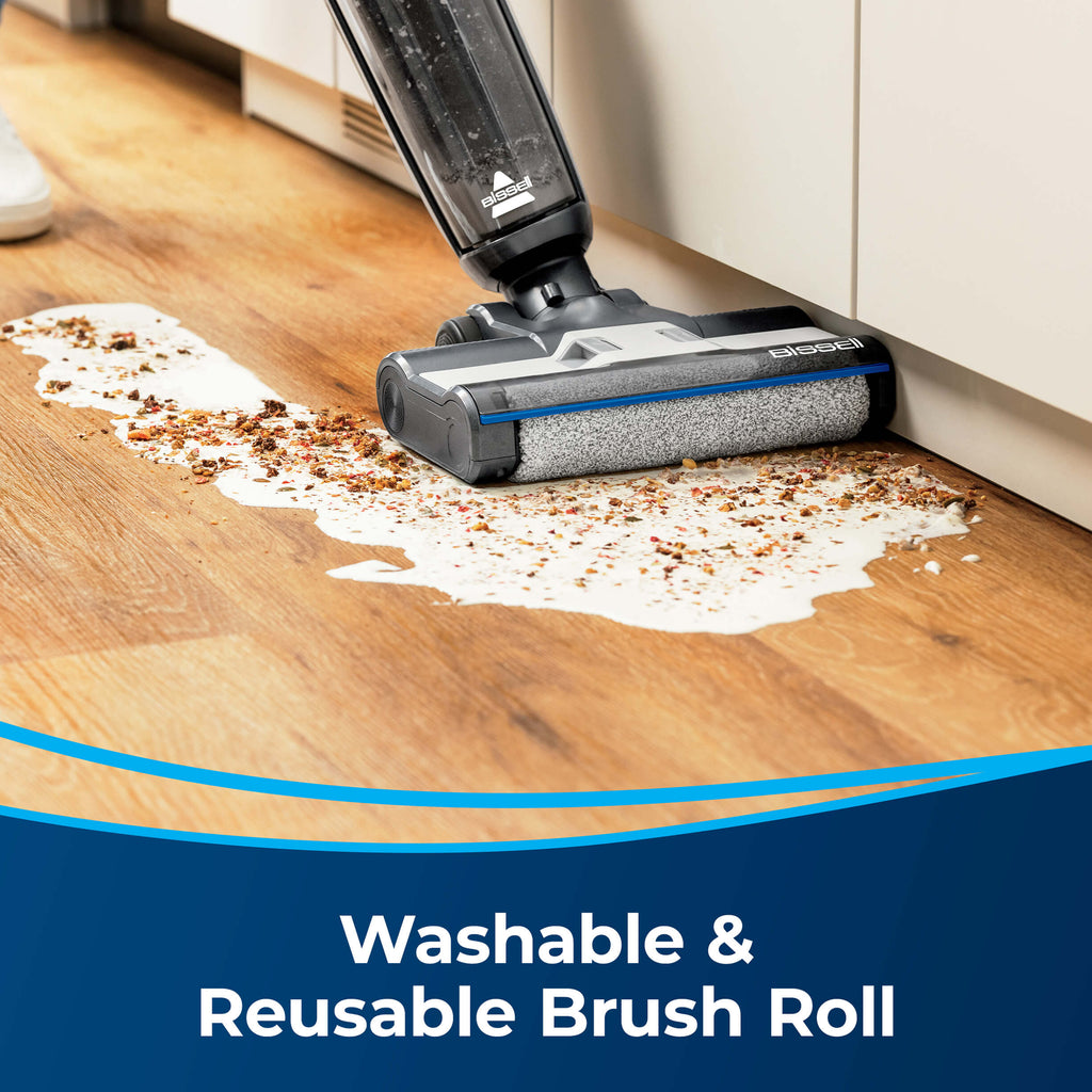 Using CrossWave HF3 to Clean Spilled Milk from hard
                        flooring. Text: Washable & Reusable Brush Roll