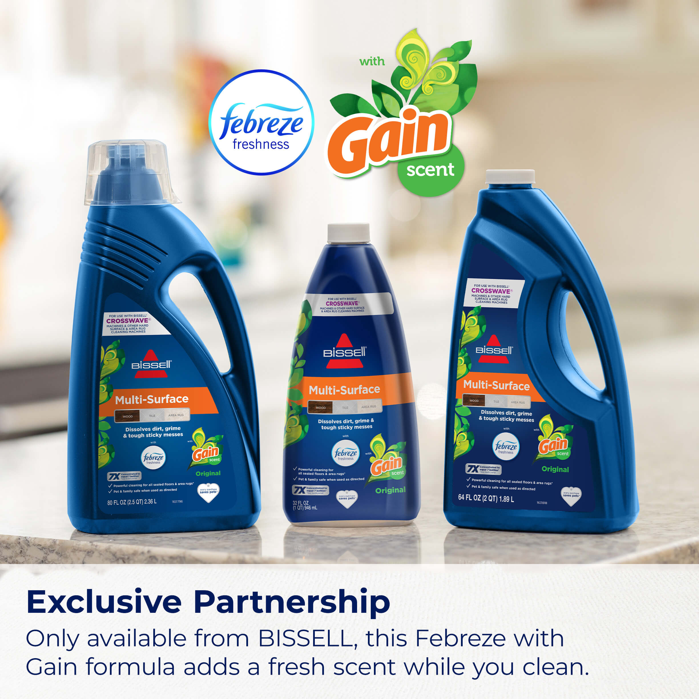Three bottles of Febreze with Gain Formulas. Text:
                        Exclusive Partnership Only available from BISSELL, this Febreze with Gain
                        formula adds a fresh scent while you clean.
