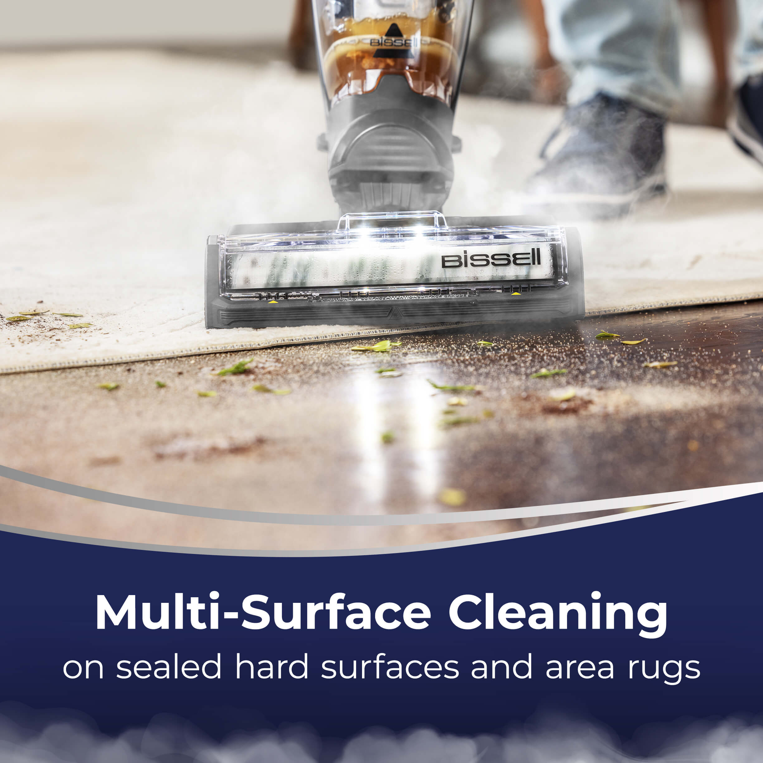 CrossWave HydroSteam moving from Area Rug to Hard
                        Flooring. Text: Multi-Surface Cleaning on sealed hard surfaces and area
                        rugs.