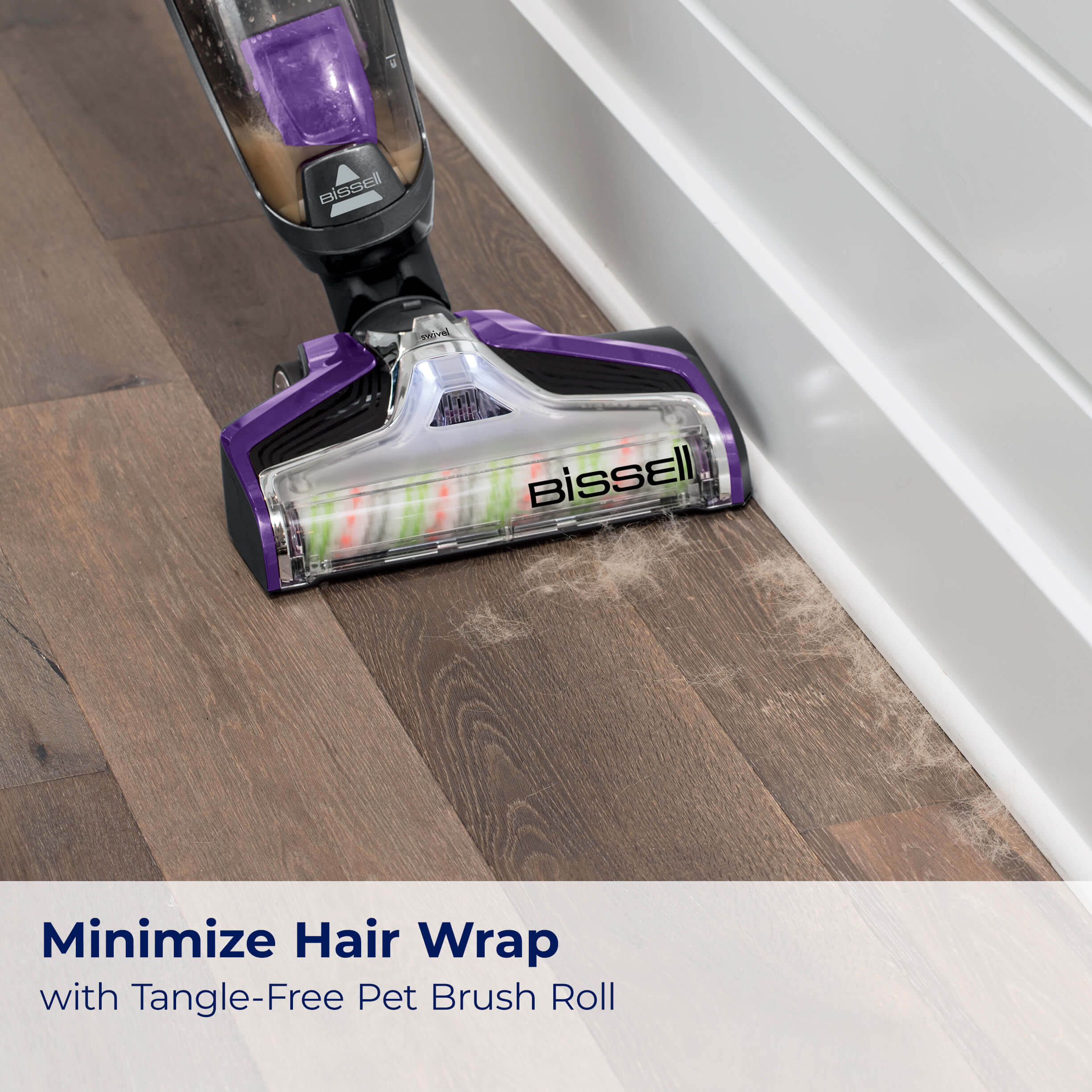 CrossWave Pet Pro Picking up pet hair along baseboard
                        on hard flooring. Text: Minimize Hair Wrap with Tangle-Free Pet Brush Roll