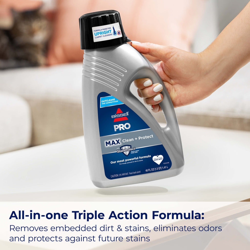 PRO MAX Clean + Protect Formula Bottle. Text:
                        All-in-one Triple Action Formula: Removes embedded dirt & Stains,
                        eliminates odors and protects against future stains.
