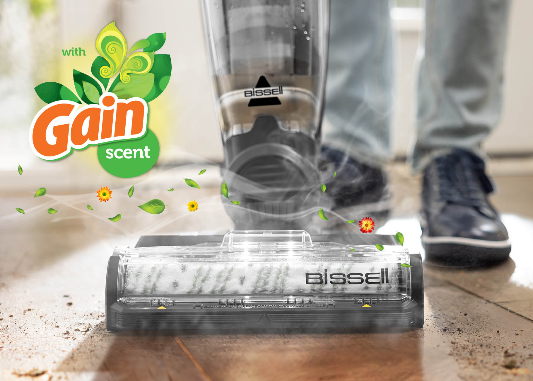 CrossWave vacuuming and mopping mud from hard flooring with Gain Logo in corner