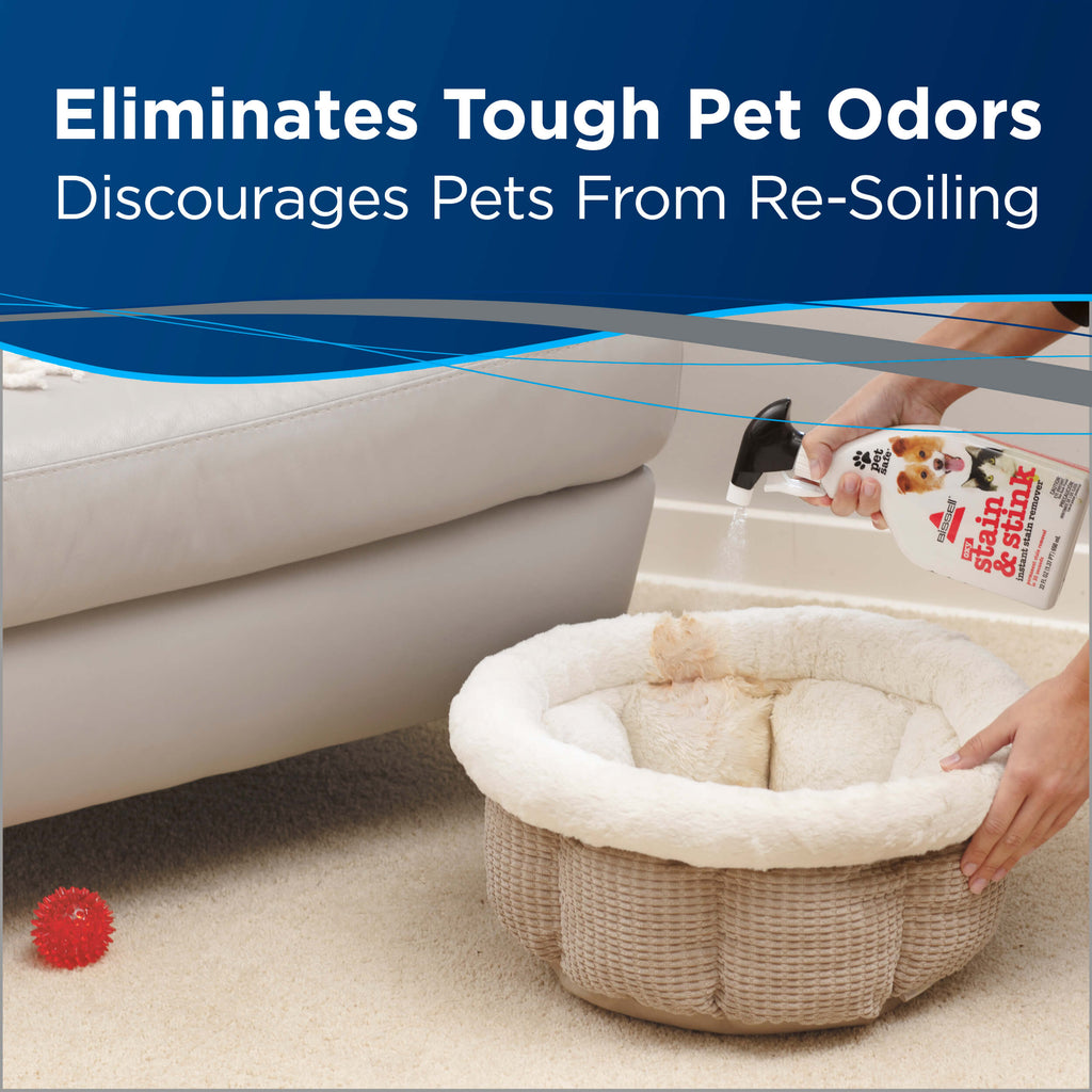 Spraying Stain & Stink 1921 on a pet bed Text:
                        Eliminates Tough Pet Odors. Discourages Pets From Re-Soiling
