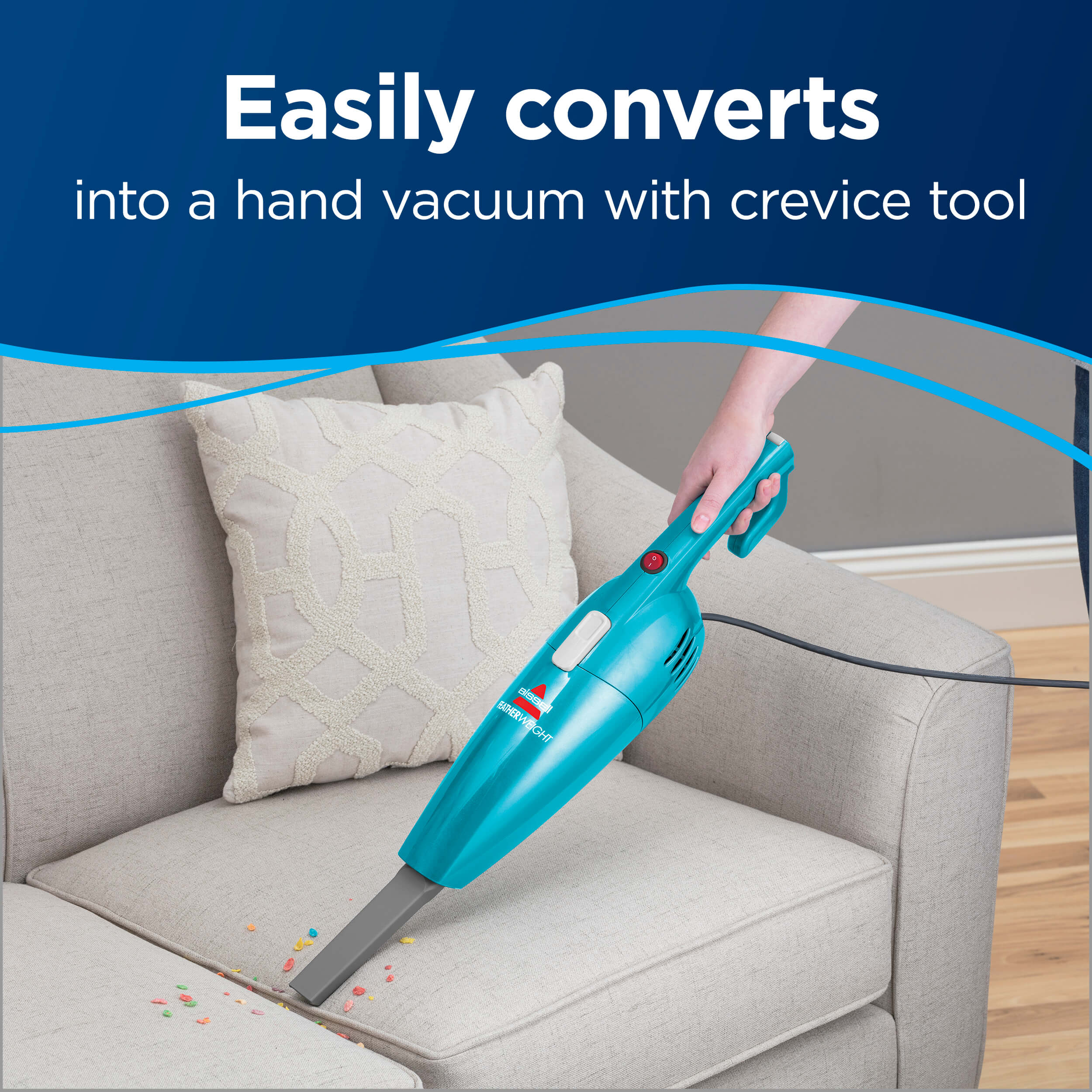 Woman Cleaning Upholstery with FeatherWeight™ Stick
                        Vac. Text: Easily Converts into a Hand Vacuum with Crevice Tool