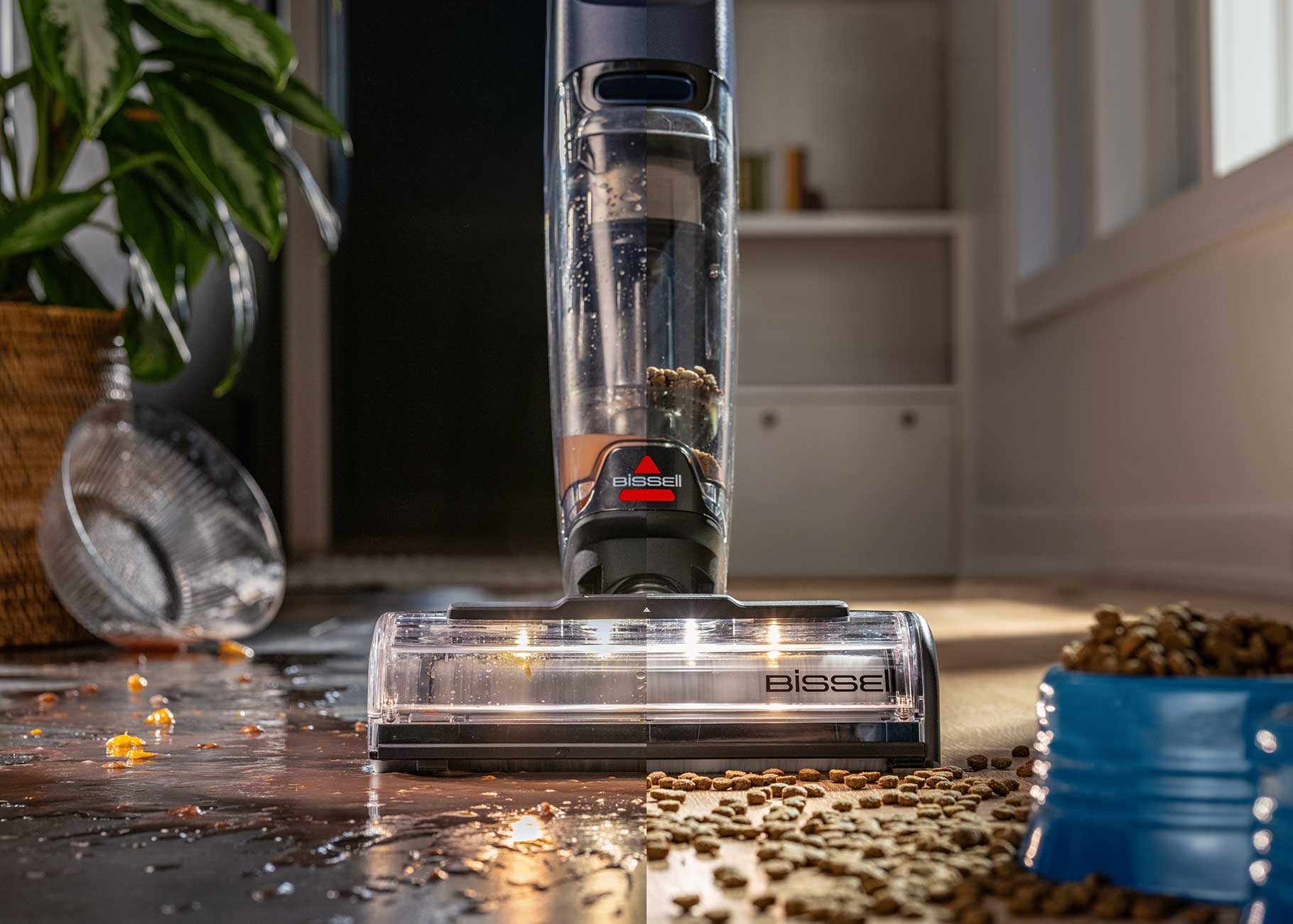 vacuuming and mopping dog food from hard flooring