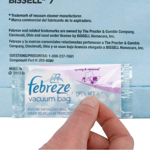 Febreze Style 7 Vacuum Bags 17F91 person peeling scent
                        card bag to smell