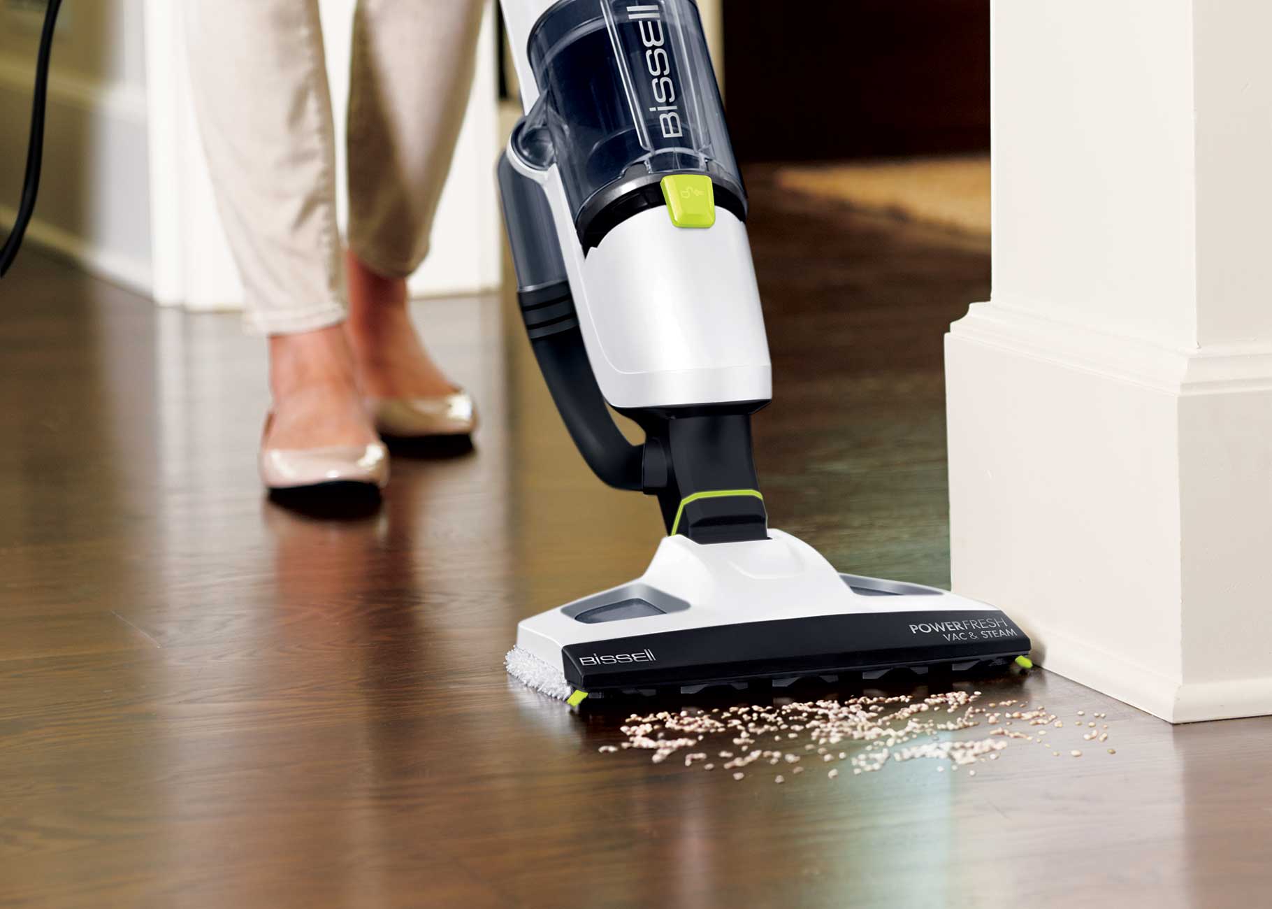 Vacuuming and mopping spill on hard flooring