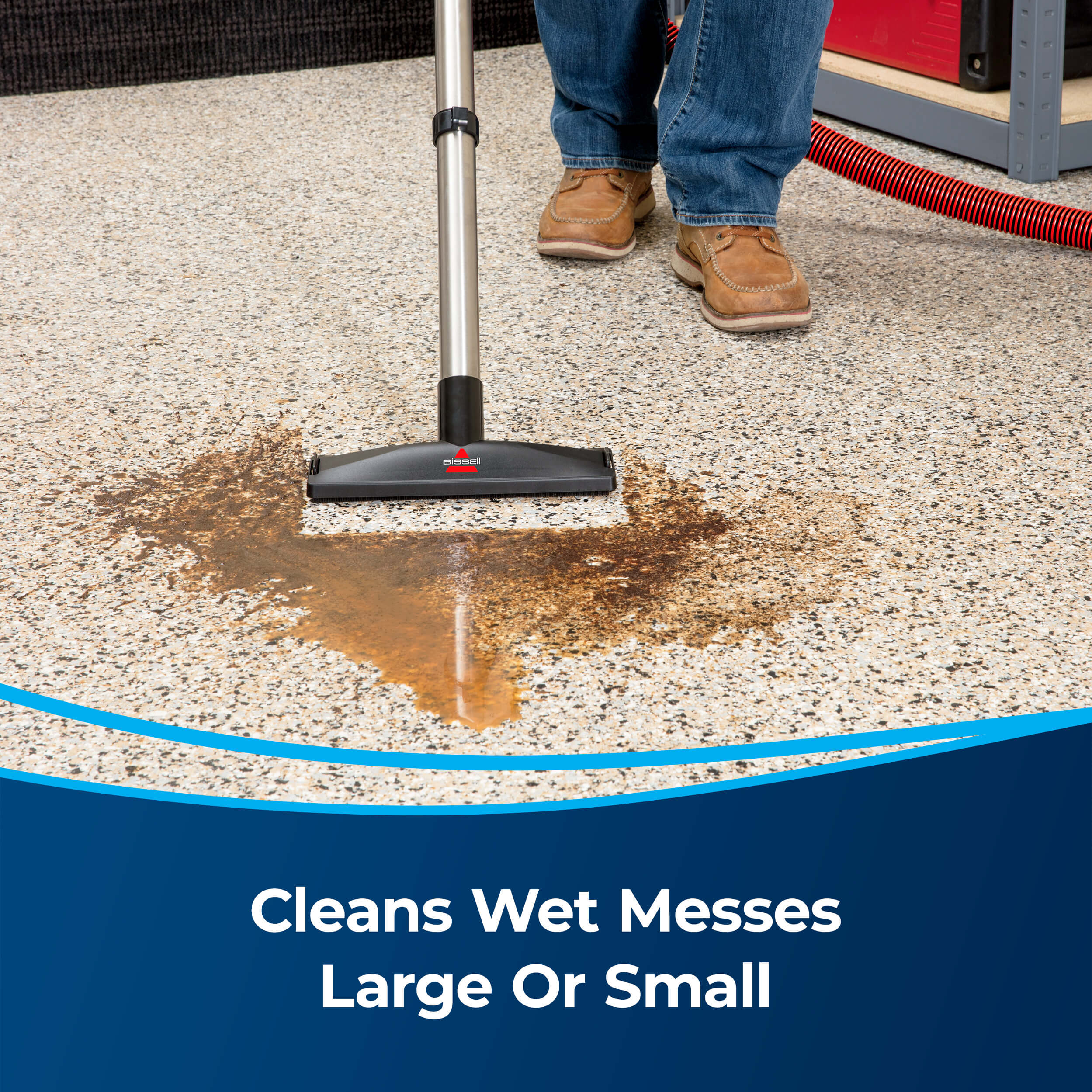 MultiClean Wet and Dry Auto Vacuum Vacuuming Wet Mess
                        on Garage Flooring. Text: Cleans Wet Messes Large or Small