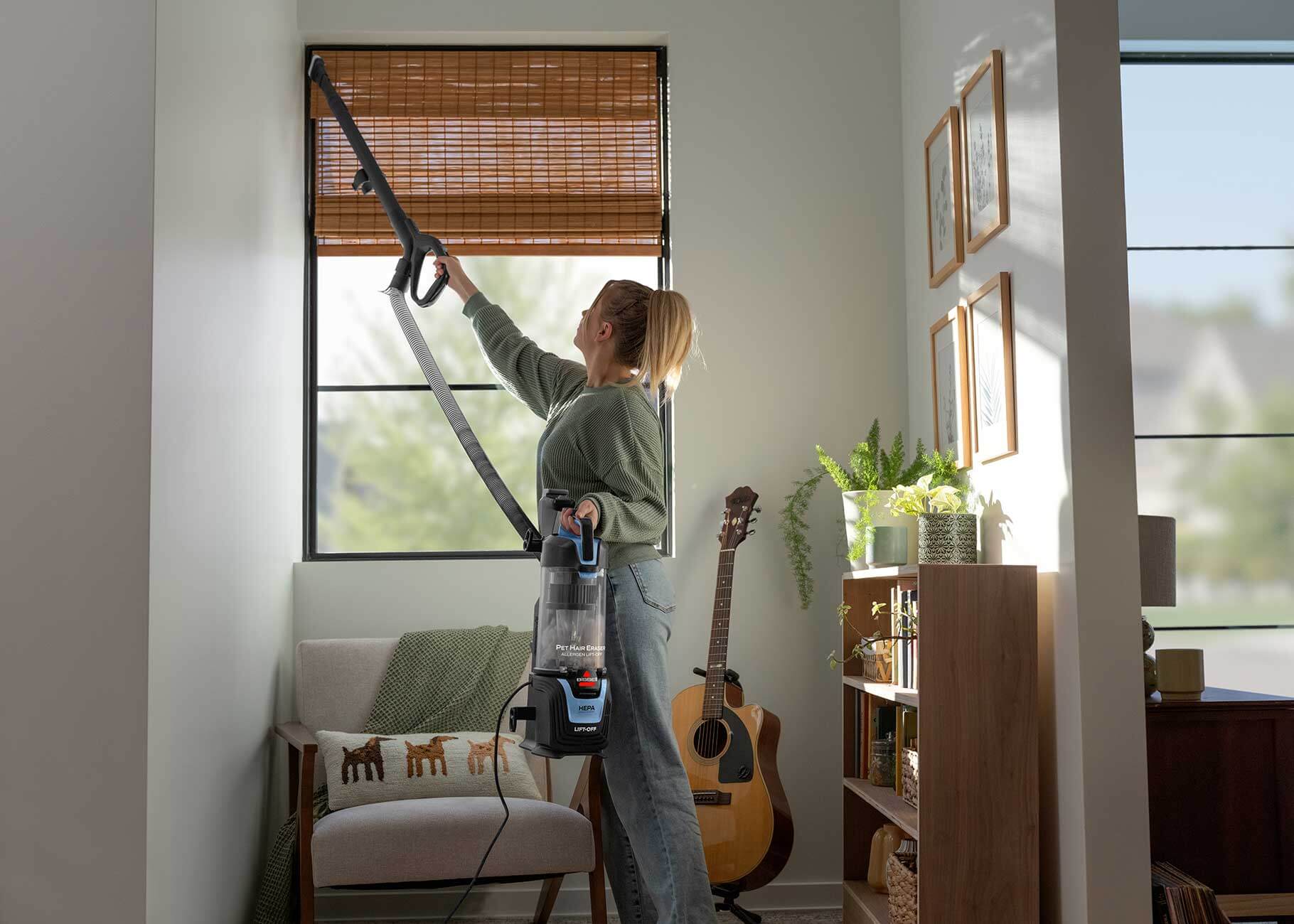 Using Lift-Off Pod with Extension Wand to vacuum above flooring