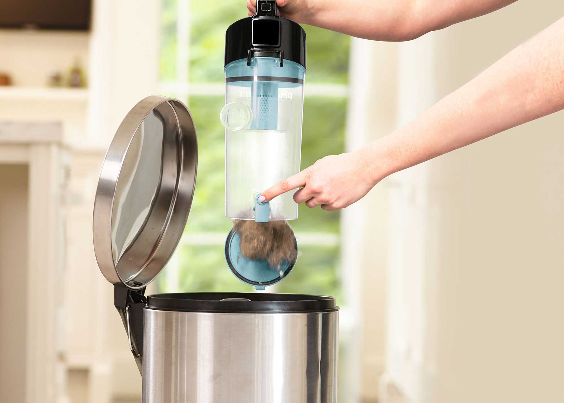 Emptying dirt bin into trash