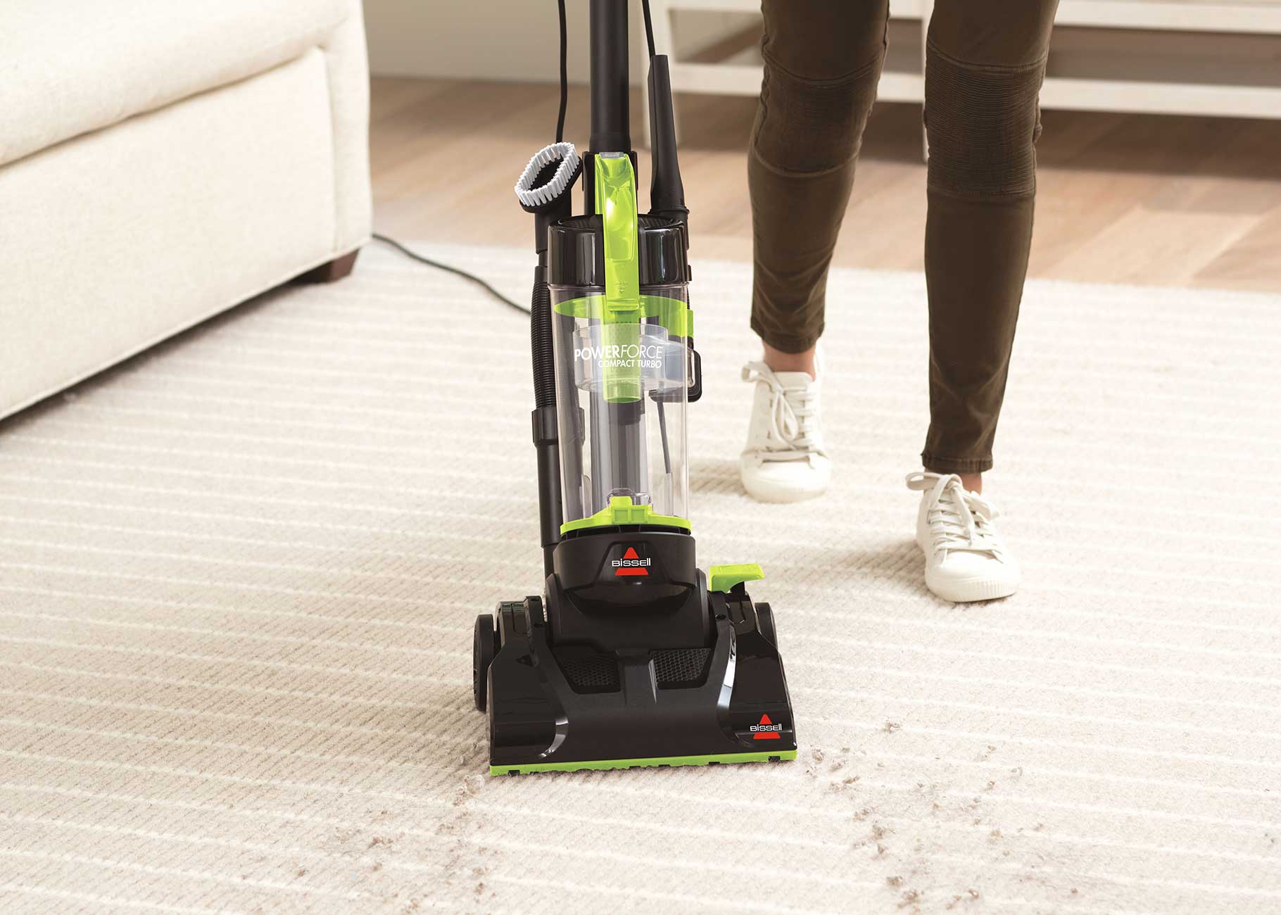 Vacuuming dirt from carpet