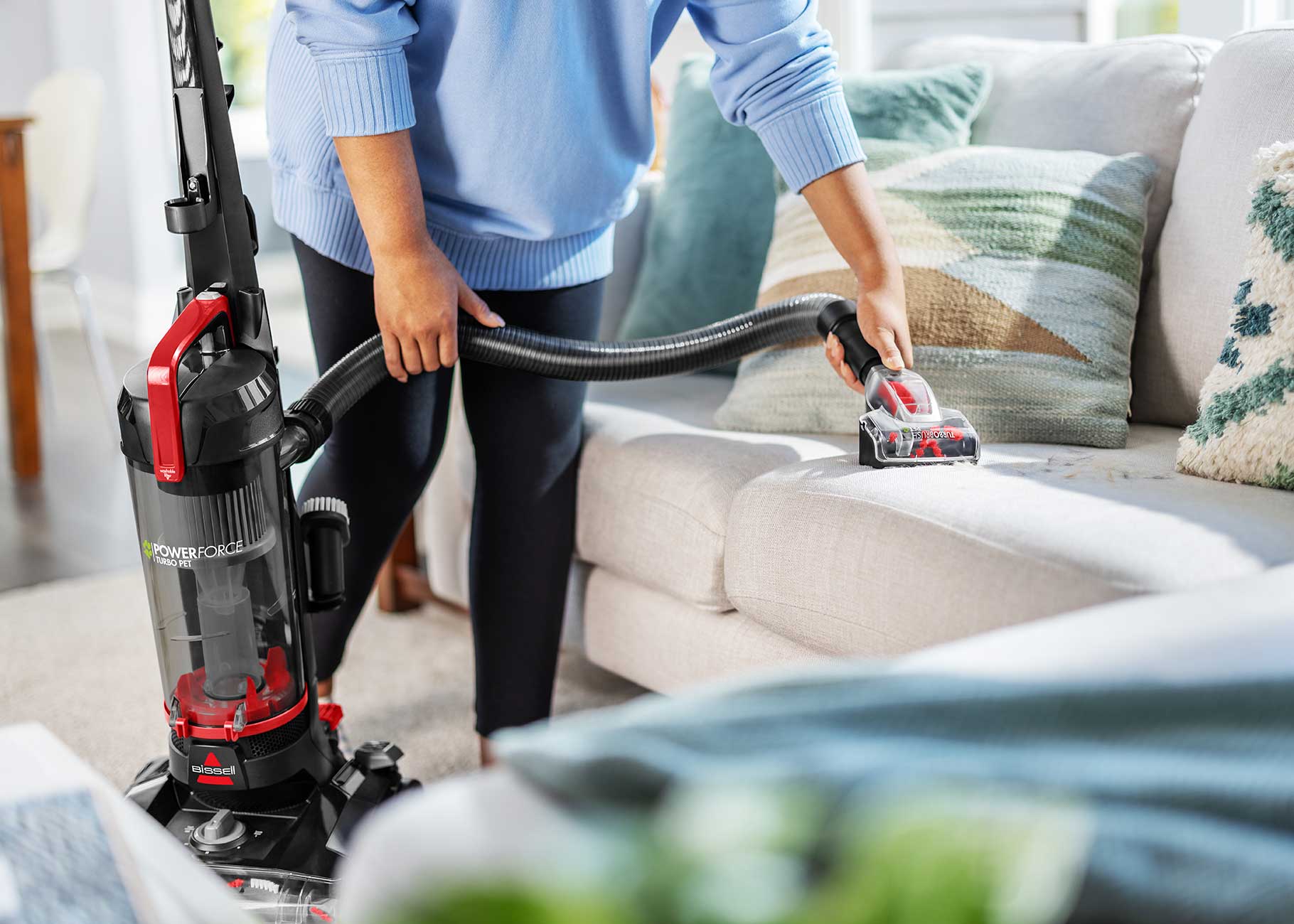 Using TurboBrush on hose to vacuum upholstery