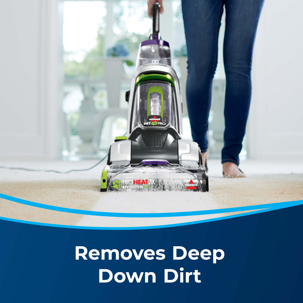 ProHeat 2X Revolution Pet Pro cleaning carpet. Text:
                        Removes Deep Down Dirt